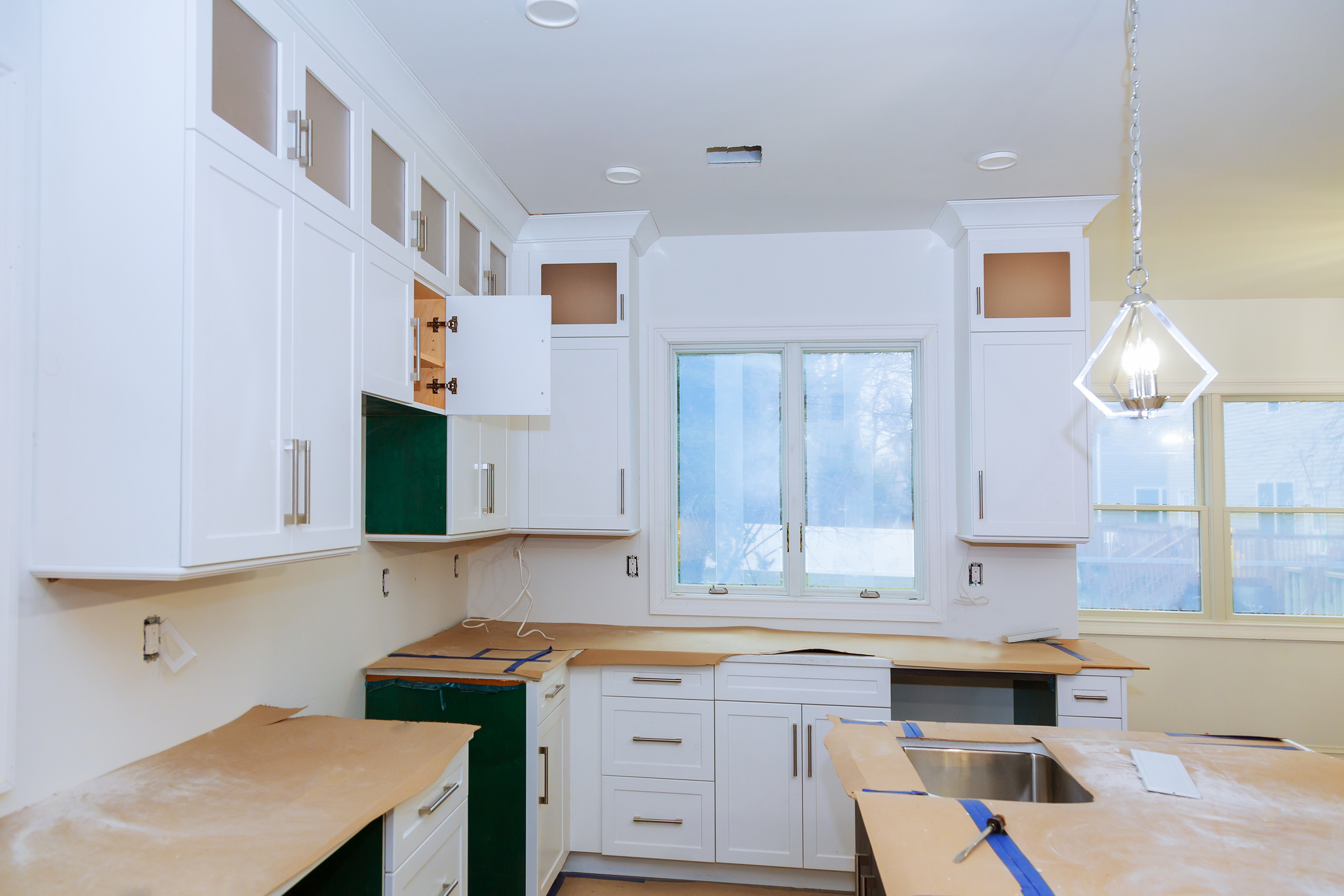 modern kitchen cabinet. Blind corner cabinet, island drawers and counter cabinets installed